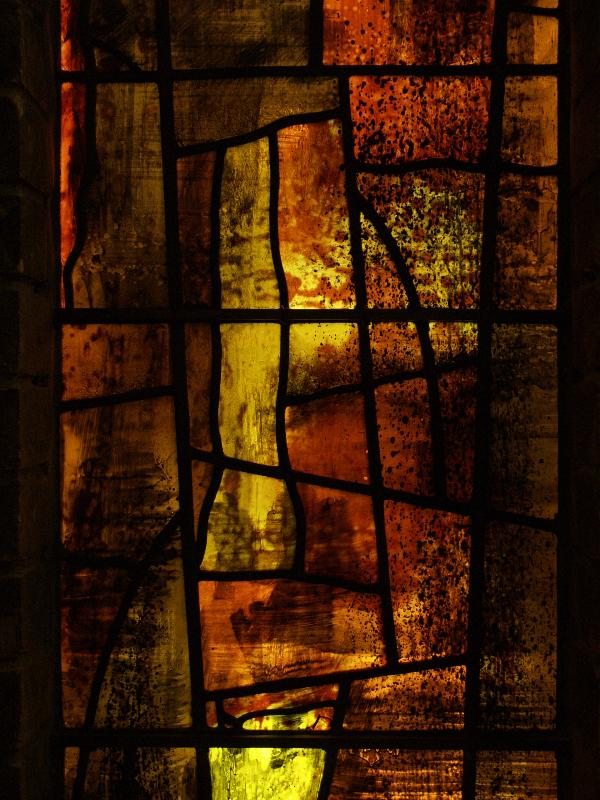 Cambridge, England: Churchill College: chapel, brown-yellow stained glass, detail (1967, artist John Piper)