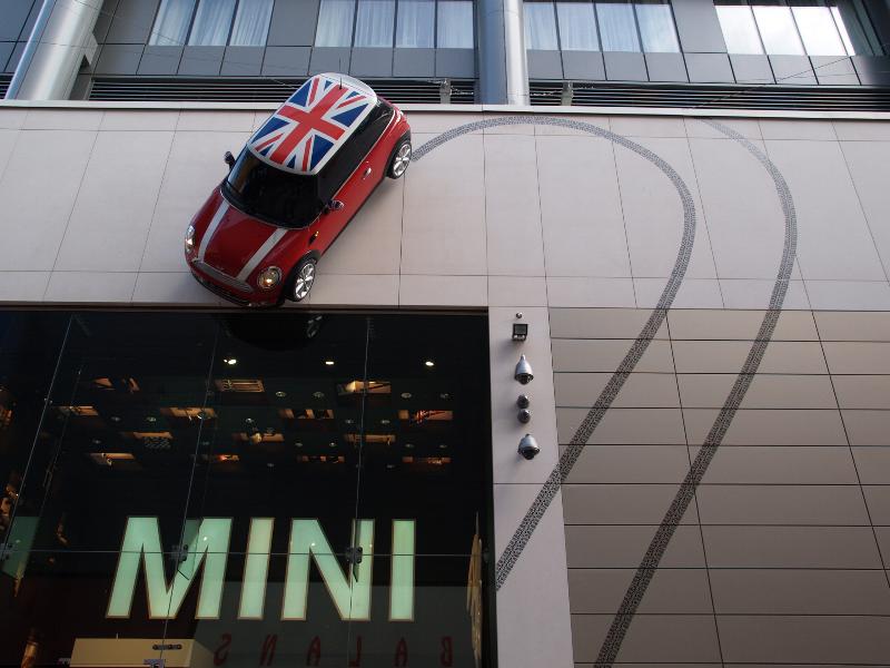 London, England: Westfield Stratford City: Mini hanging from wall