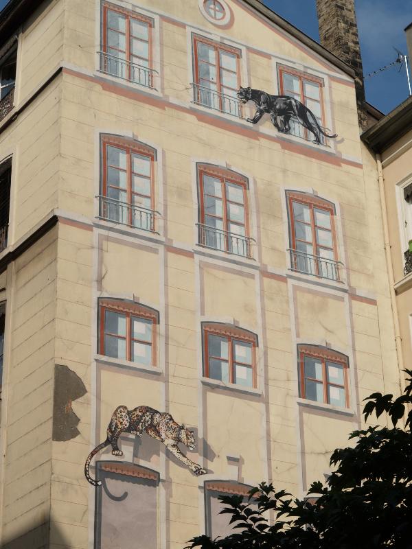 Lyon, France: Rue de la Platiere: panther and leopard, trompe l'oeil