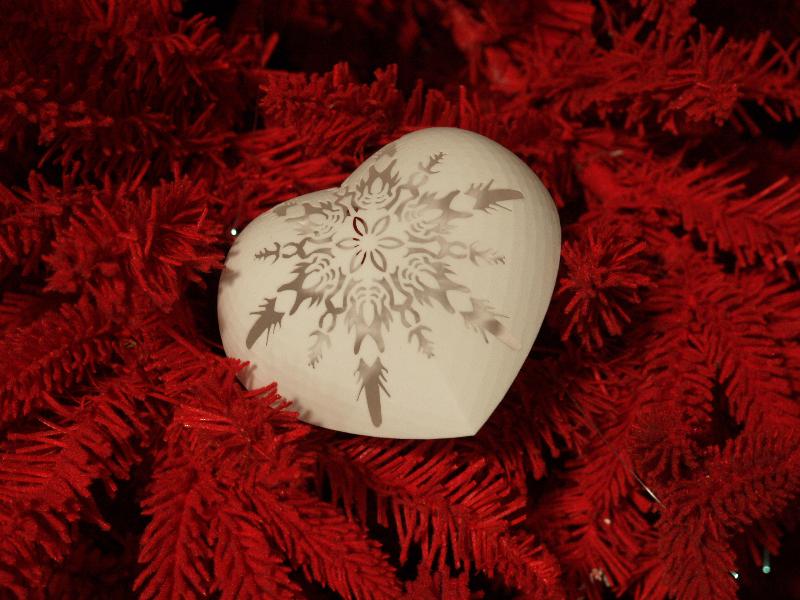 London, England: Victoria and Albert Museum: heart-shaped bauble decoration (Red Velvet Tree of Love, 2013, Helen and Colin David)