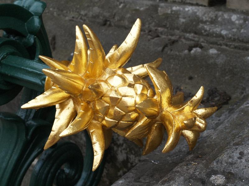 Cambridge, England: Fitzwilliam Museum: golden pineapple fence decoration