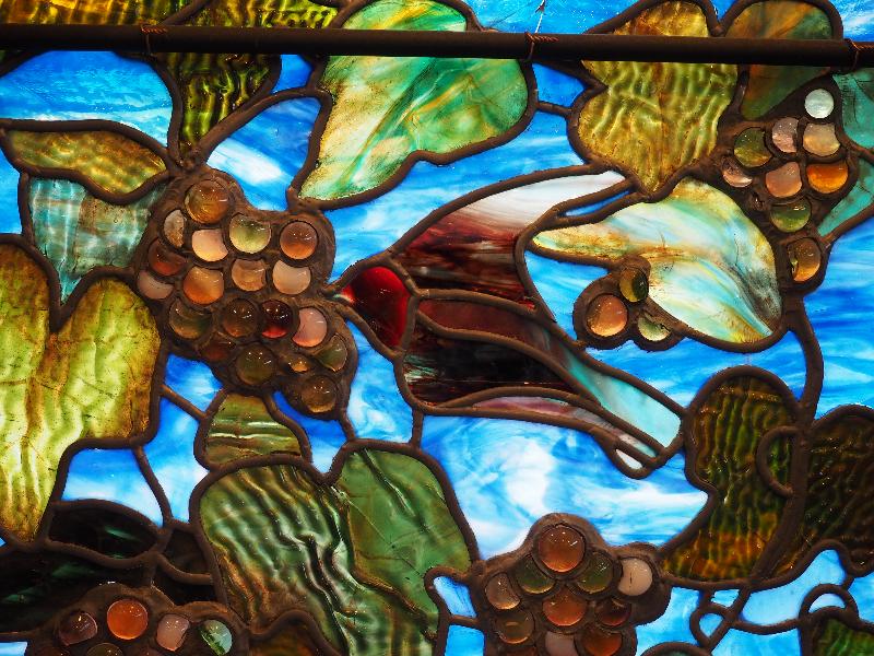 Horseheads, New York (NY): First Presbyterian Church: Good Sheperd window, bird eating grapes (1888, Tiffany Glass)