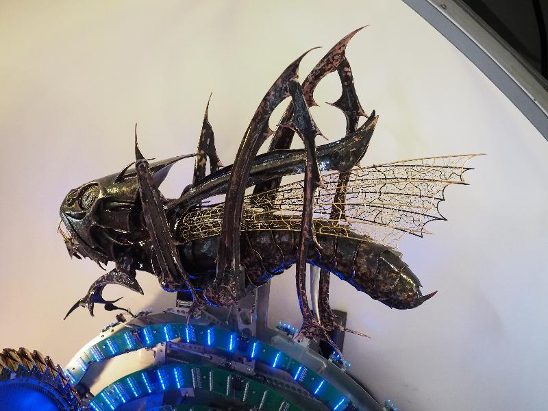 Cambridge, England: Corpus Christi College: Corpus Clock (2003-2008, designed by John Taylor), grasshopper escapement (sculpted by Matthew Lane Sanderson)