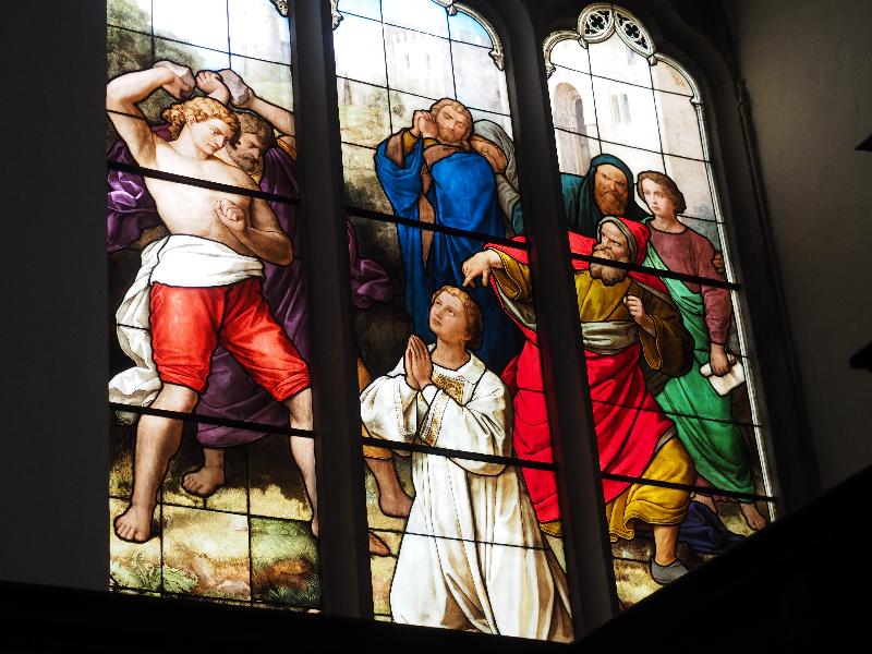Cambridge, England: Peterhouse: chapel stained glass window, stoning of St Stephen (1850s, overall design by Max Emanuel Ainmiller, figures largely work of Claudius Schraudolph and Heinrich von Hess, Royal School of Glass Painting, Munich)