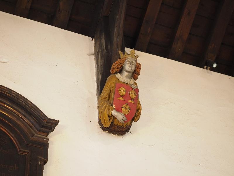 Cambridge, England: St Bene't's Church: ceiling support head