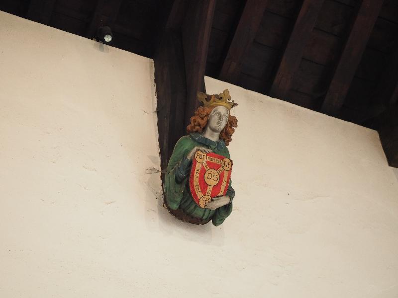 Cambridge, England: St Bene't's Church: ceiling support head
