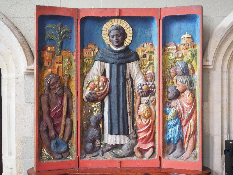 Leicester, England: Holy Cross Priory Church: painted wood relief carving