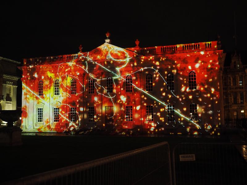 Cambridge, England: Senate House: yellow/red/brown light (eLuminate Cambridge Festival, SPIRITUS - Light and Darkness, by Ross Ashton and Karen Monid)