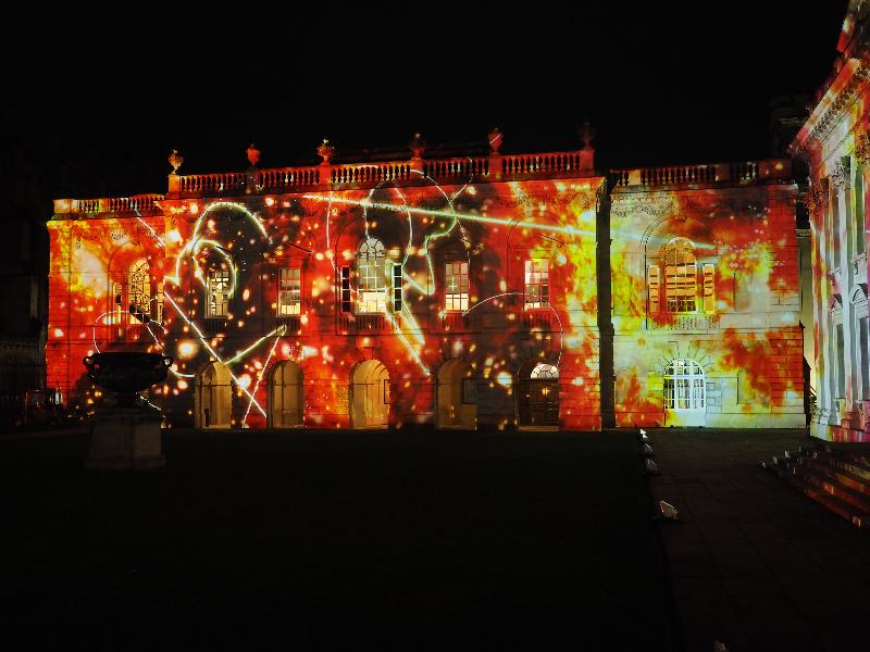 Cambridge, England: Old Schools: red/yellow/brown fire (eLuminate Cambridge Festival, SPIRITUS - Light and Darkness, by Ross Ashton and Karen Monid)