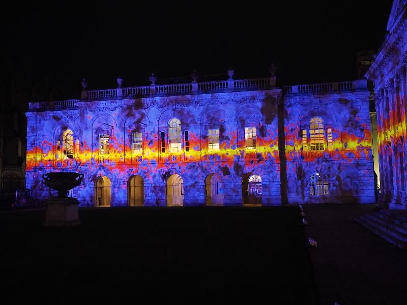 Cambridge, England: Old Schools: purple/red/yellow fire (eLuminate Cambridge Festival, SPIRITUS - Light and Darkness, by Ross Ashton and Karen Monid)