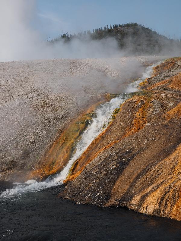 Yellowstone National Park, Wyoming (WY): Midway Geyser Basin: hot water flowing into Firehole River