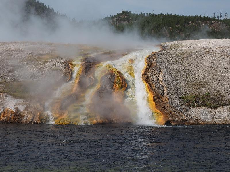 Yellowstone National Park, Wyoming (WY): Midway Geyser Basin: hot water flowing into Firehole River