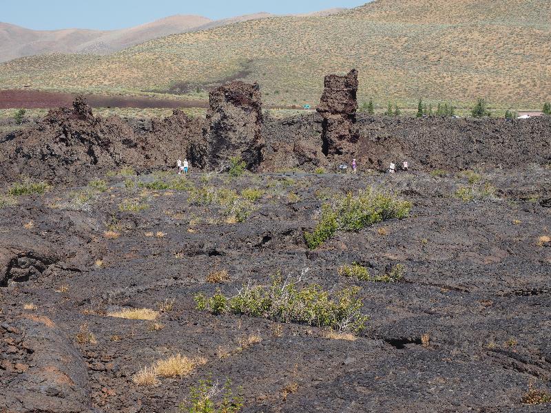 Craters Of The Moon National Monument, Idaho (ID): North Crater Flow Trail: cinder cone fragments in distance