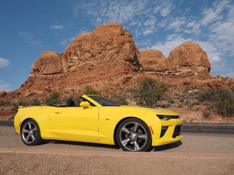 Arches National Park, Utah (UT): Arches Scenic Drive: Rock Pinnacles with yellow Camaro