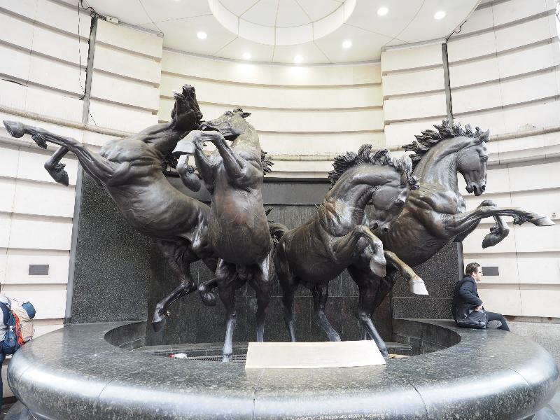 London, England: corner of Haymarket and Coventry Street: The Horses of Helios (unveiled 1992, architect Peter Howard of RHWL Partnership, sculptor Rudy Weller)
