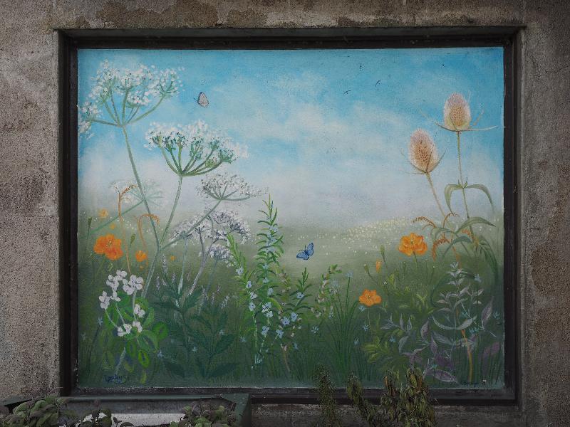 London, England: Wanstead tube station: summer scene (2017, Katherine Poluck and Karen Humpage)