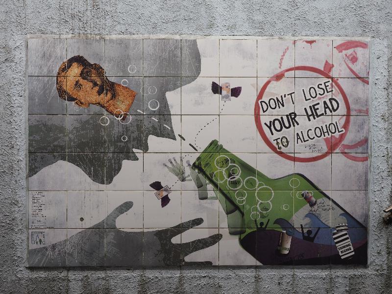 Newcastle-under-Lyme, England: Ryecroft underpass: Don't Lose Your Head to Alcohol (artists Sarah Nadin and Nicola Winstanley with help from many other people)