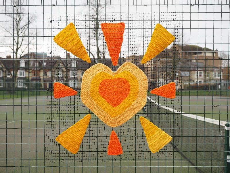 Cambridge, England: Jesus Green: orange and yellow sun (Cambridge Yarn Collective)
