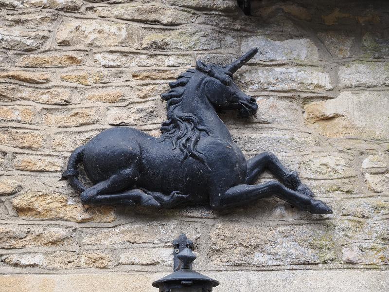 Castle Combe, England: The Street: unicorn decoration