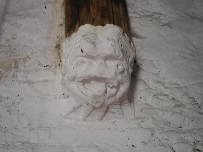 Cambridge, England: Stourbridge Leper Chapel: buttress support, ogre