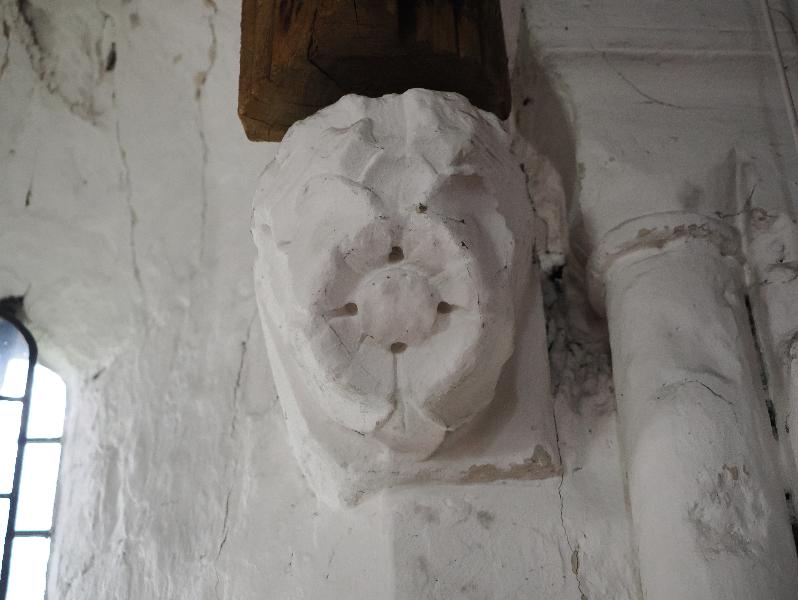 Cambridge, England: Stourbridge Leper Chapel: buttress support, rose