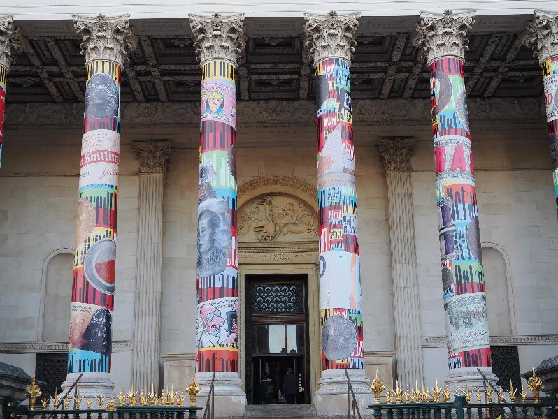 Cambridge, England: Fitzwilliam Museum: columns decorated for Defaced! Money, Conflict, Protest exhibition (11 Oct 2022 - 8 Jan 2023)