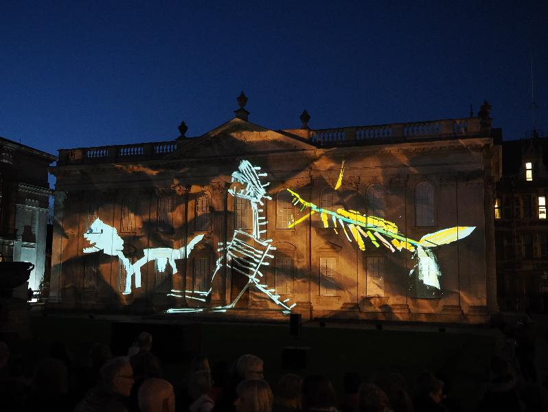 Cambridge, England: Senate House: Carnival! (part of Cambridge Music Festival, lightshow produced by Novak, using artwork by students from Castle, Arbury, St Matthews and Galfrid primary schools during workshops led by Hilary Cox-Condron)