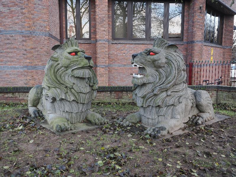 Cambridge, England: City House: two lions