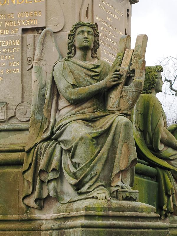 Amsterdam, Netherlands: Vondelpark: Joost van den Vondel Statue (1867, Louis Royer), angel with lyre