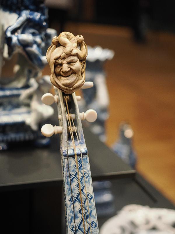 Amsterdam, Netherlands: Rijksmuseum: Violin (faience, ca. 1705-1710, Delft), scroll