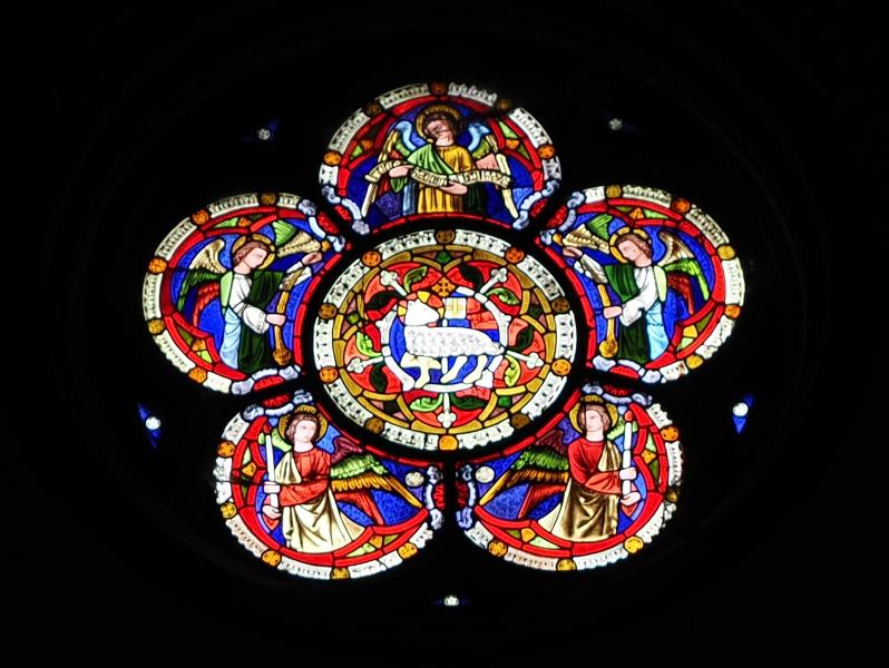 Cambridge, England: Jesus College: chapel, round(ish) window at top of chancel (Agnus Dei rosette, 1850, Hardman)