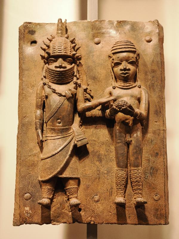 London, England: British Museum: cast brass plaque, two men (16th century, Benin, Nigeria)