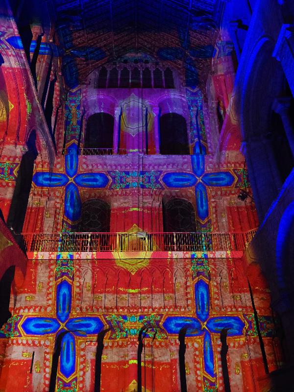 Ely, England: Ely Cathedral: red and blue design (Crown and Coronation, by Luxmuralis, originally shown at Tower of London, Nov 2023)