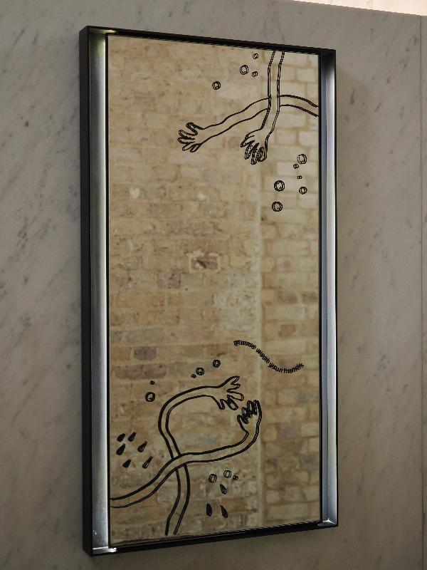 London, England: Royal Academy: mirror in men's bathroom