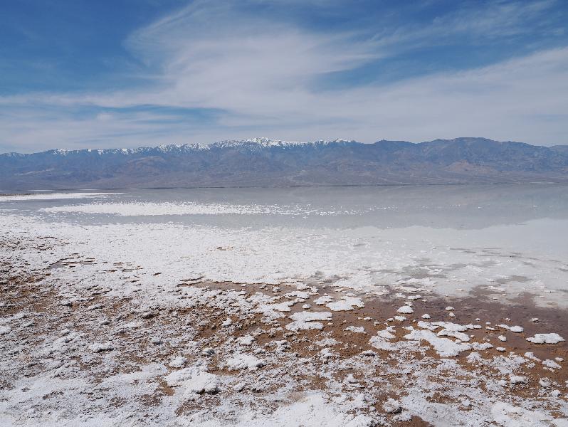Death Valley National Park, California (CA): Badwater Road: view west across salt lake (towards Telegraph Peak)