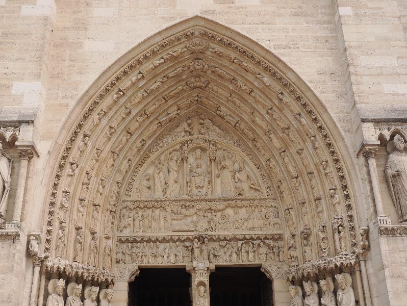 Paris, France: Notre-Dame Cathedral: tympanum over right door