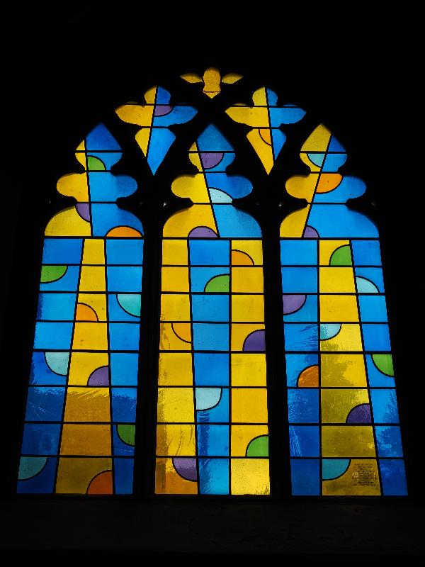 Norwich, England: Norwich Cathedral: blue / yellow window (Holy Trinity, 2014, John McLean)