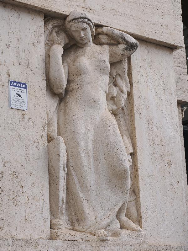 Milan, Italy: Palazzo Mezzanotte / Borsa Italiana: female figure (1930, Geminiano Cibau)