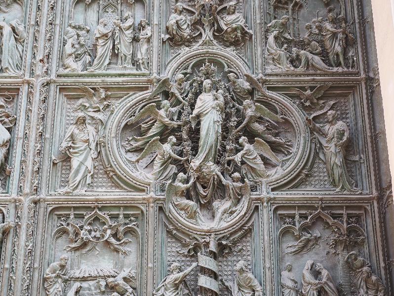 Milan, Italy: Duomo di Milano: central door decoration, Madonna and Child (1906, Ludovico Pogliaghi)