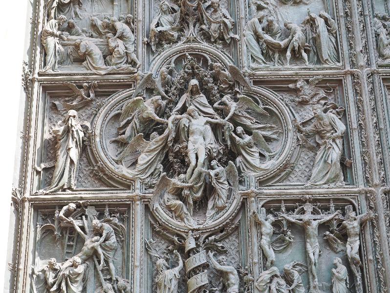 Milan, Italy: Duomo di Milano: central door decoration, Descent from the Cross (1906, Ludovico Pogliaghi)