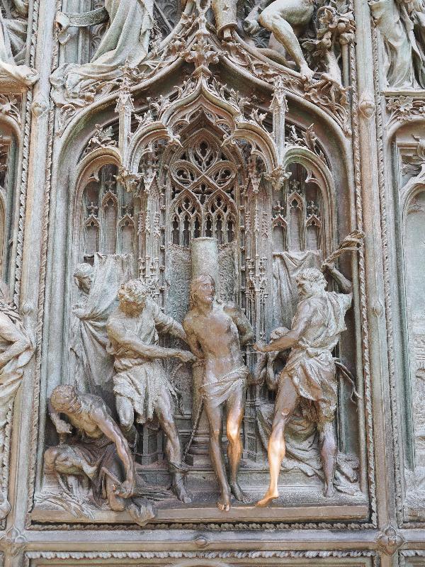 Milan, Italy: Duomo di Milano: central door decoration, Flagellation of Christ (1906, Ludovico Pogliaghi)