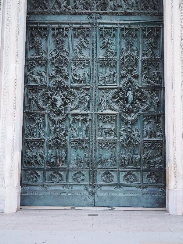 Milan, Italy: Duomo di Milano: central entrance, Joy and Sorrow of the Virgin Mary (1906, Ludovico Pogliaghi)