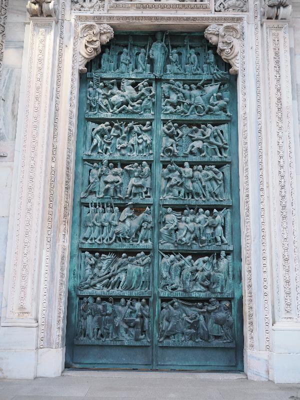 Milan, Italy: Duomo di Milano: right of central entrance, The Contribution of the Milanese Church (1937, Franco Lombardi, Virgilio Pessina)