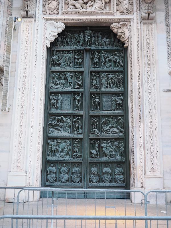 Milan, Italy: Duomo di Milano: far left entrance, Constantine's 313 Edict of Milan (1948, Arrigo Minerbi)