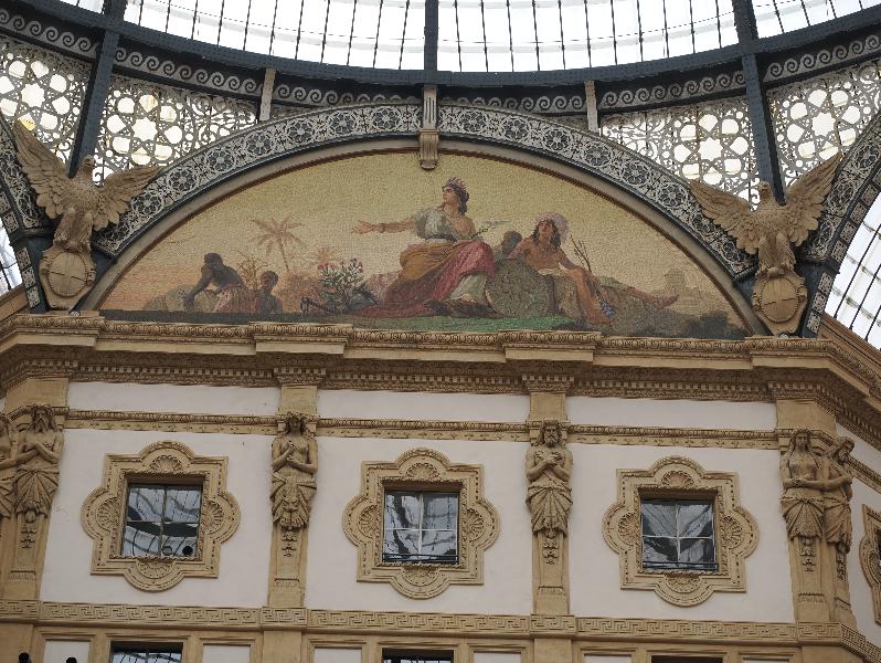 Milan, Italy: Galleria Vittorio Emanuele II: center, corner decoration, America lunette mosaic