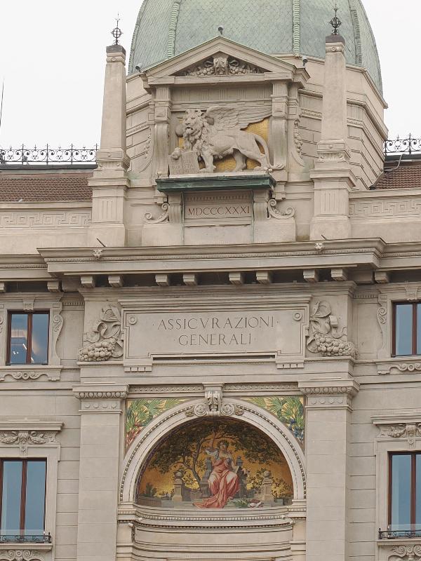 Milan, Italy: Palazzo delle Assicurazioni Generali: facade (1897-1901), winged lion and mythological scene