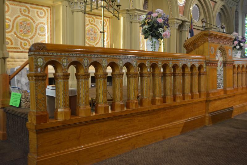 mosaic and tilework on pulpit, chancel rail and sedilia