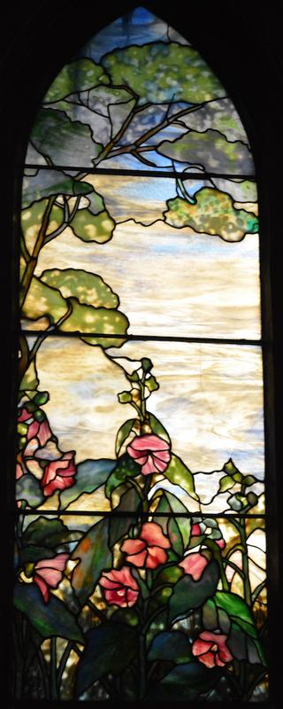 landscape with hollyhocks