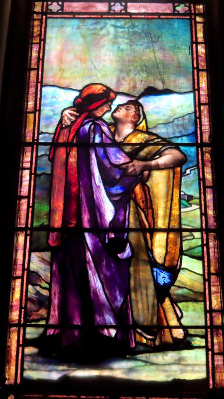 two figures embracing