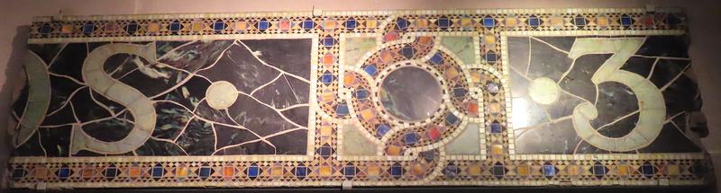 fragments of Tiffany Studios building signage
